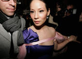 Lucy Liu leaves the Valentino fashion show during Paris Fashion Week Spring-Summer 2008