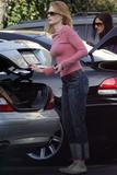 Marg Helgenberger in jeans and pink top