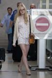 th_46679_Preppie_Elle_Fanning_arriving_at_LAX_Airport_6_122_225lo.jpg