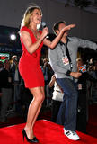 Cameron Diaz in red dress showing her elgs and cleavage at What Happens In Vegas premiere in Westwood